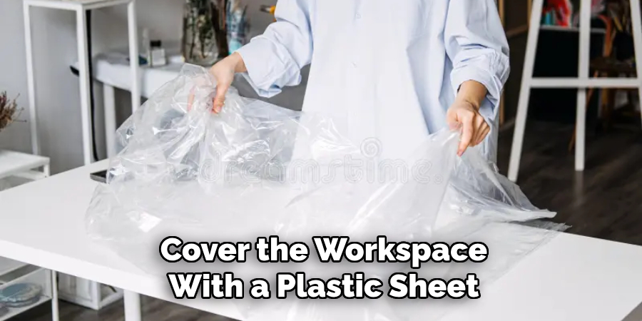 Cover the Workspace
With a Plastic Sheet