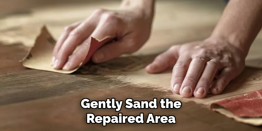 Gently Sand the
Repaired Area