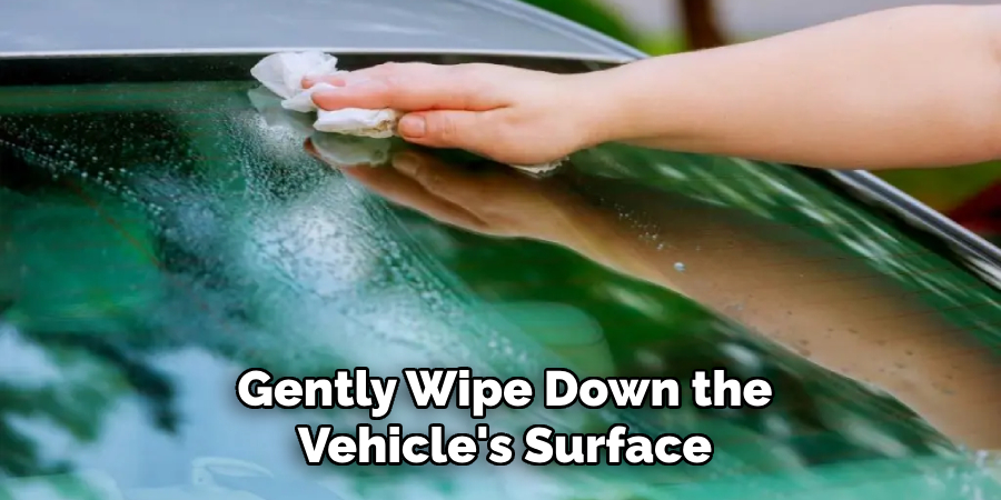 Gently Wipe Down the
Vehicle's Surface