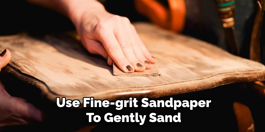 Use Fine-grit Sandpaper
To Gently Sand