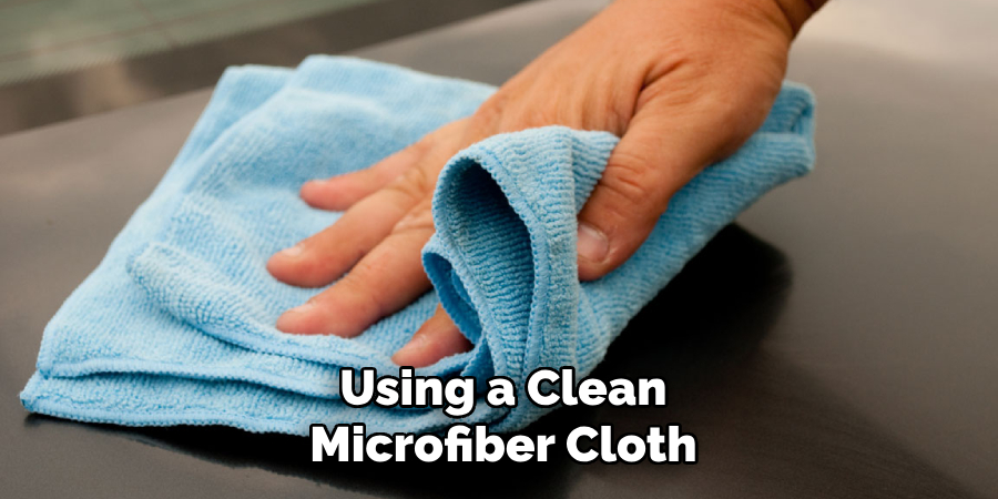 Using a Clean
Microfiber Cloth