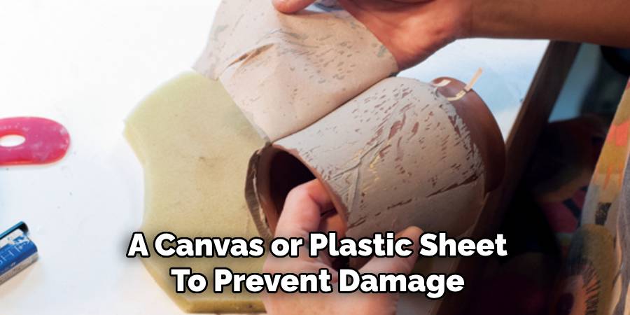 A Canvas or Plastic Sheet
To Prevent Damage