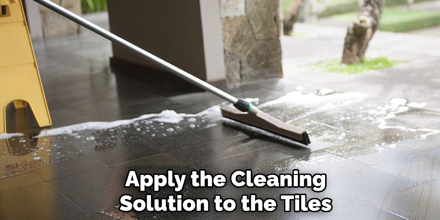 Apply the Cleaning
Solution to the Tiles