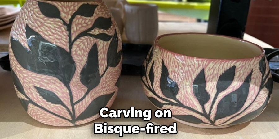 Carving on
Bisque-fired