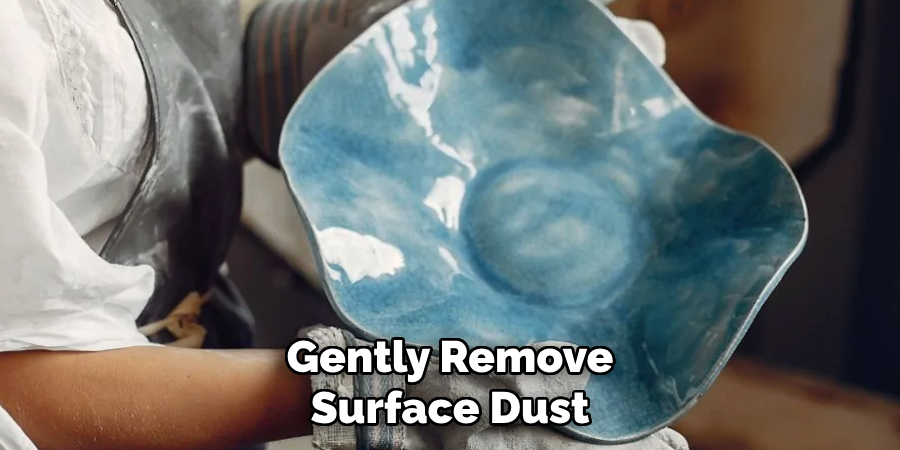 Gently Remove
Surface Dust