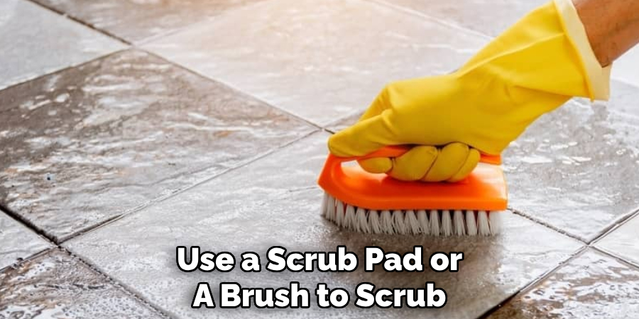 Use a Scrub Pad or
A Brush to Scrub