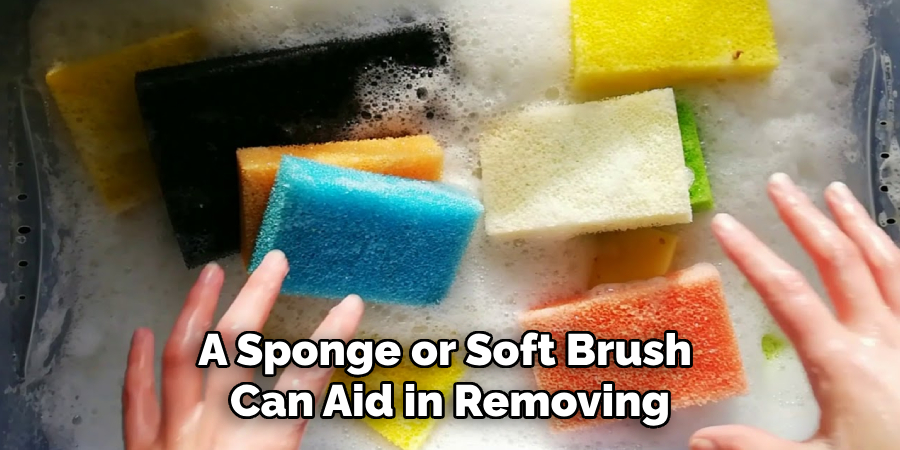 A Sponge or Soft Brush Can Aid in Removing