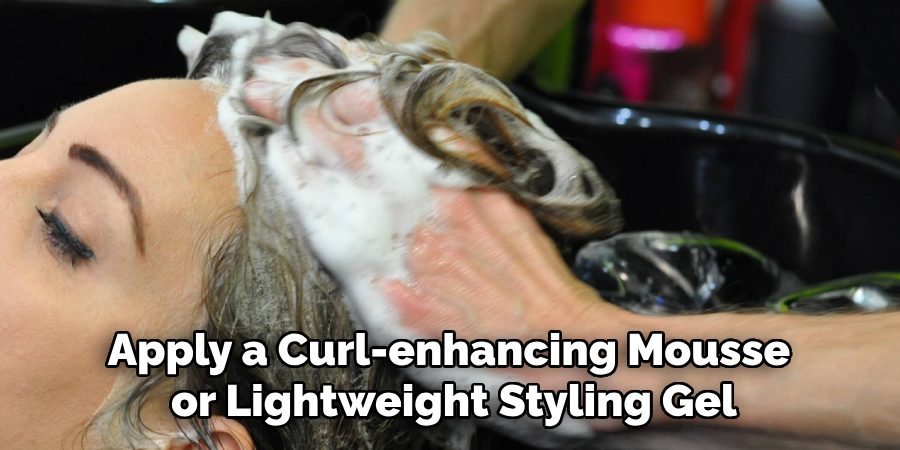 Apply a Curl-enhancing Mousse or Lightweight Styling Gel