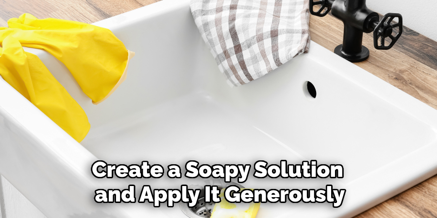 Create a Soapy Solution and Apply It Generously