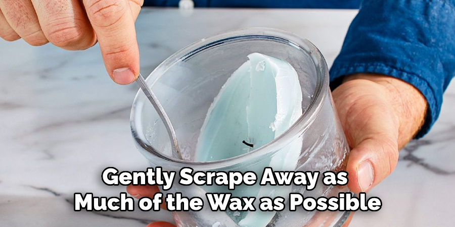 Gently Scrape Away as Much of the Wax as Possible