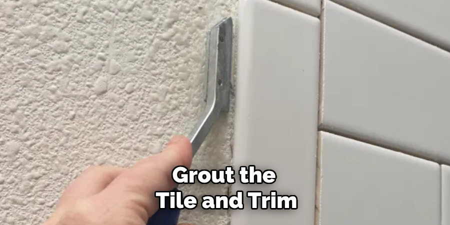 Grout the Tile and Trim