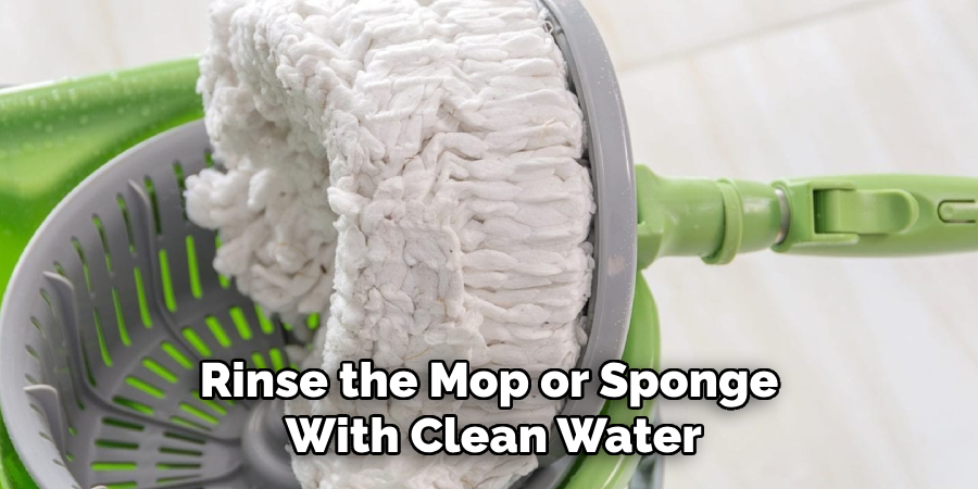 Rinse the Mop or Sponge With Clean Water