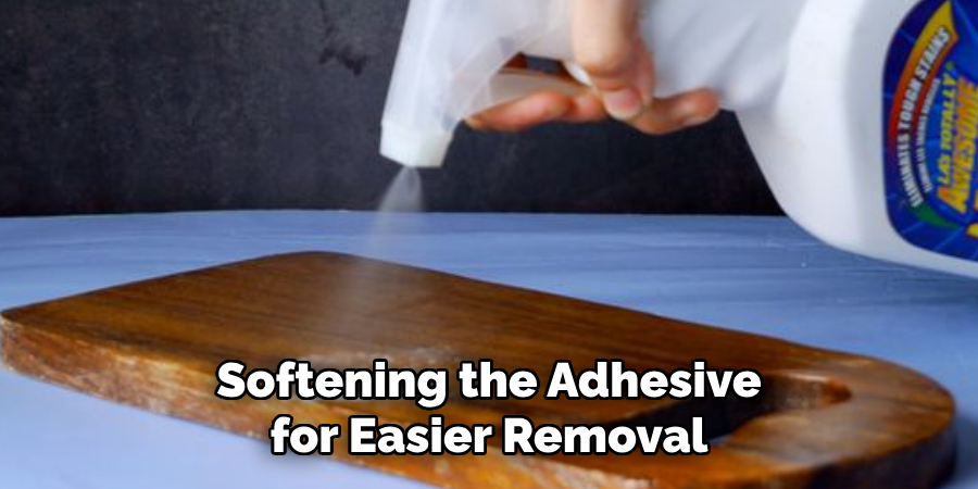 Softening the Adhesive for Easier Removal