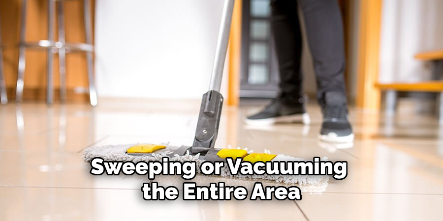 Sweeping or Vacuuming the Entire Area