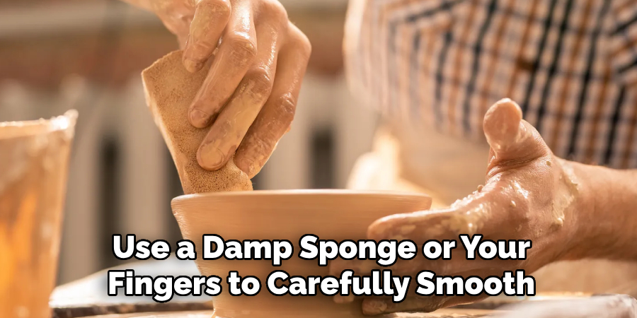 Use a Damp Sponge or Your Fingers to Carefully Smooth