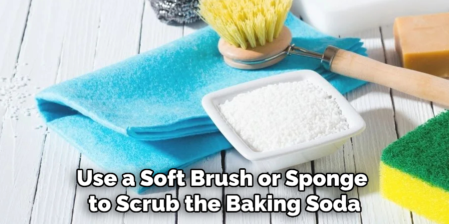 Use a Soft Brush or Sponge to Scrub the Baking Soda