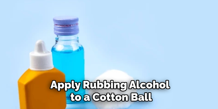 Apply Rubbing Alcohol to a Cotton Ball