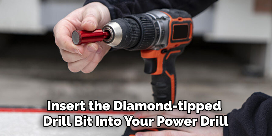 Insert the Diamond-tipped Drill Bit Into Your Power Drill