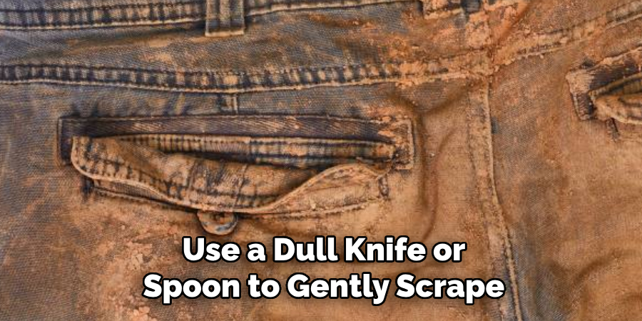 Use a Dull Knife or Spoon to Gently Scrape